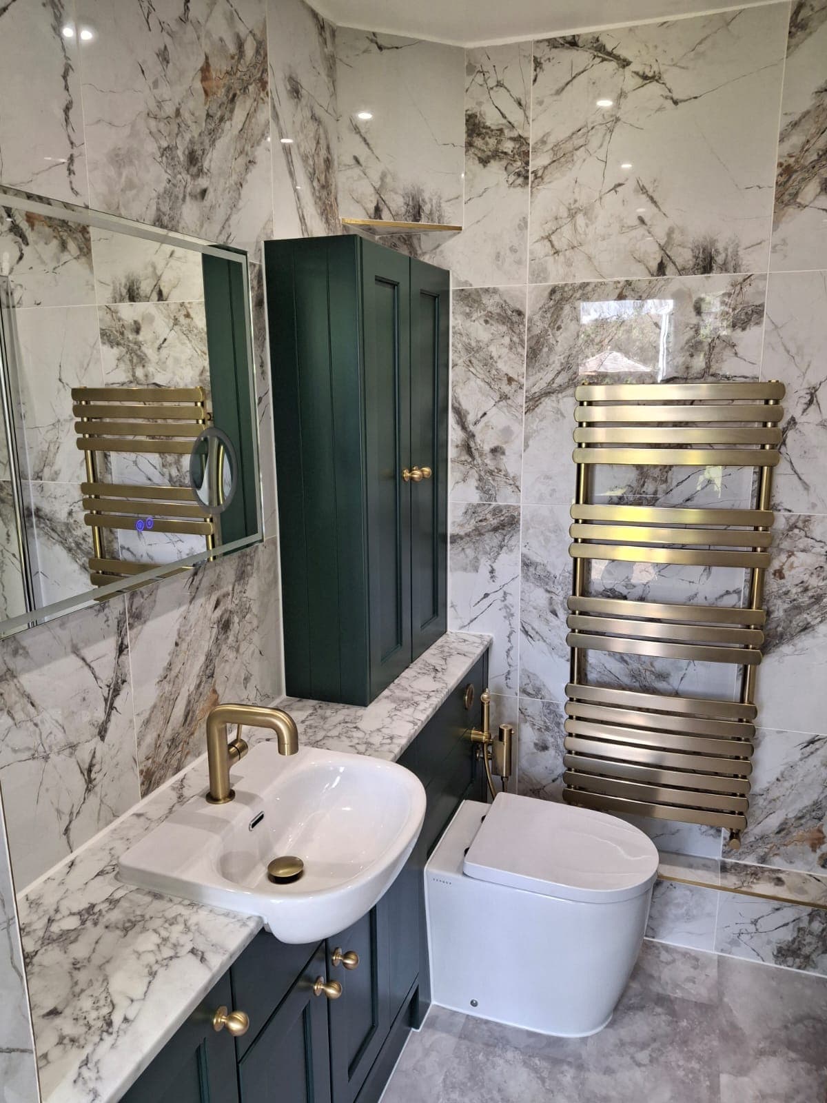 Marble and gold bathroom fitted by HOC Home Improvements in Surrey