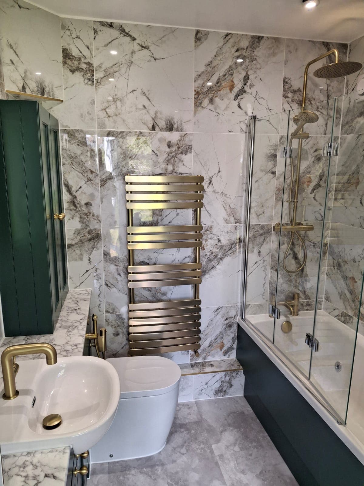 Marble-effect tiled walk-in shower fitted by HOC Home Improvements
